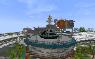 The Astro Orbiter spinning above Rockettower Plaza in Magic Parks Tomorrowland, with the monorail beamway behind it